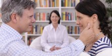 couple making up at therapy session with psychologist